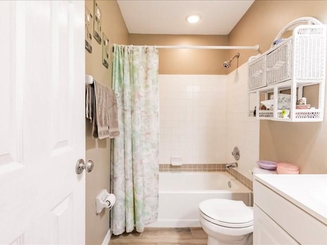 1244 Corktree E, Port Charlotte, FL 33952 - full bathroom featuring shower / tub combo with curtain, vanity, and wood finished floors