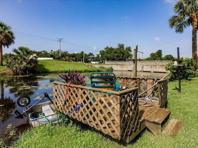 1244 Corktree E, Port Charlotte, FL 33952 - wooden terrace featuring a yard