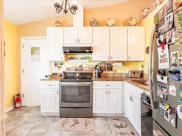 1244 Corktree E, Port Charlotte, FL 33952 - kitchen featuring stainless steel appliances, lofted ceiling, extractor fan, white cabinetry, and stone counters