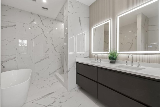 bathroom featuring vanity and a bathing tub