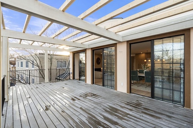 wooden deck featuring a pergola