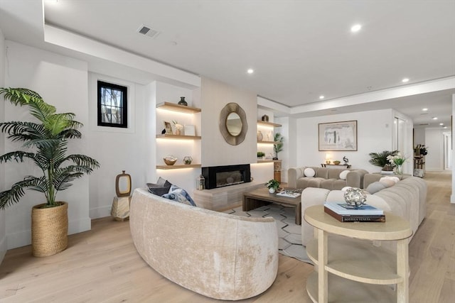 living room featuring light wood-type flooring