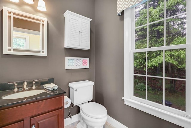 15 Sylvan Dr, Stow, MA 01775 - half bathroom with baseboards, vanity, and toilet