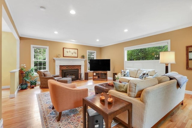 15 Sylvan Dr, Stow, MA 01775 - living area featuring crown molding, baseboards, light wood-style floors, a fireplace, and recessed lighting