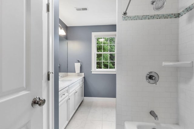 15 Sylvan Dr, Stow, MA 01775 - bathroom with marble look tile flooring, vanity,  shower combination, and baseboards