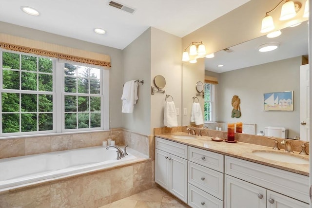 15 Sylvan Dr, Stow, MA 01775 - full bath featuring double vanity, a bath, tile patterned floors, and recessed lighting