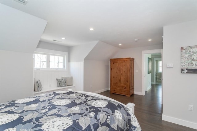 bedroom featuring dark wood-type flooring, recessed lighting, and baseboards