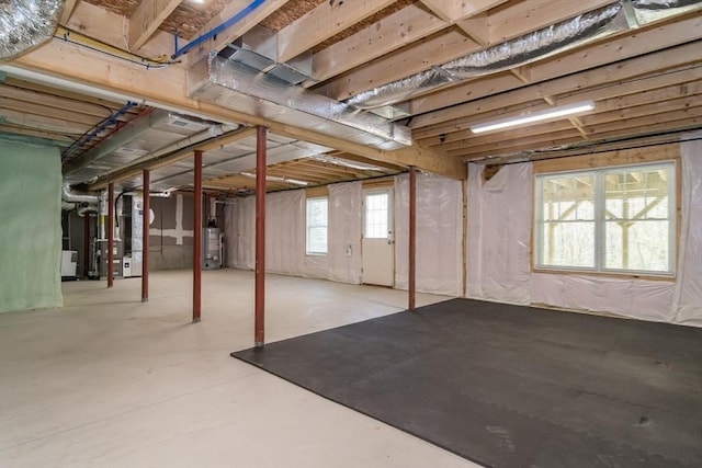 below grade area with water heater and heating unit