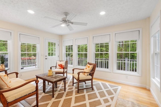 163 Candlestick Rd, North Andover, MA 01845 - sunroom / solarium with a textured ceiling, baseboards, recessed lighting, and wood finished floors