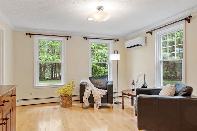 163 Candlestick Rd, North Andover, MA 01845 - sitting room with a wall mounted AC, light wood-style floors, ornamental molding, a baseboard heating unit, and a textured ceiling