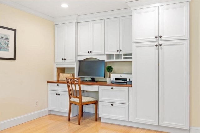 163 Candlestick Rd, North Andover, MA 01845 - office area featuring built in desk, light wood finished floors, baseboards, and recessed lighting