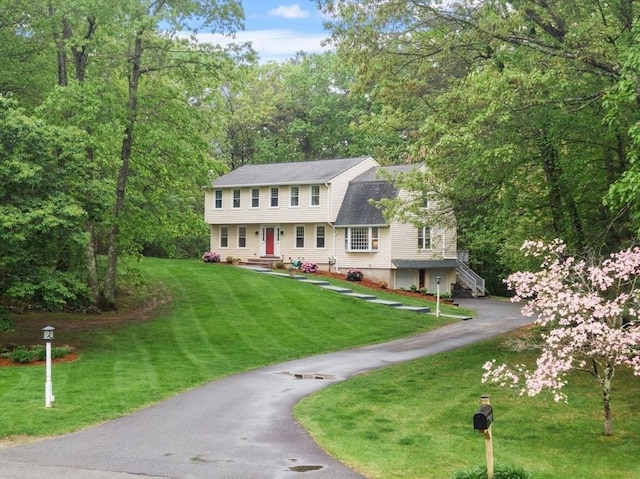 163 Candlestick Rd, North Andover, MA 01845 - view of front facade with asphalt driveway and a front lawn