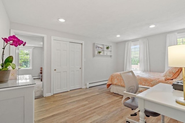 163 Candlestick Rd, North Andover, MA 01845 - bedroom with baseboard heating, multiple windows, light wood-style flooring, and recessed lighting