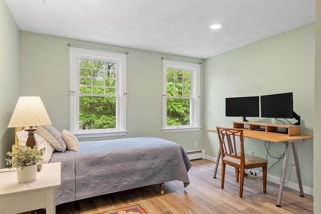163 Candlestick Rd, North Andover, MA 01845 - bedroom with wood finished floors, multiple windows, a baseboard radiator, baseboards, and recessed lighting