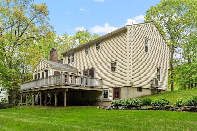 163 Candlestick Rd, North Andover, MA 01845 - back of house with a wooden deck and a lawn