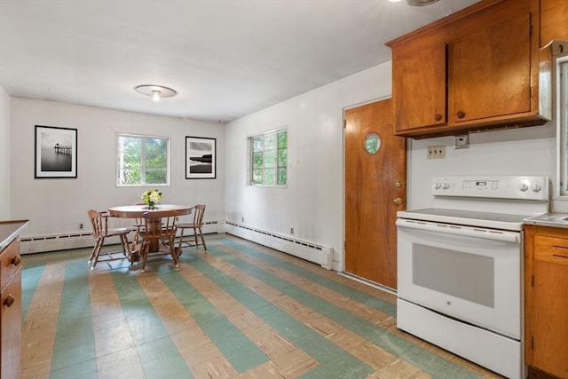 14 Forty Steps Ln, Nahant, MA 01908 - kitchen featuring electric range, brown cabinets, baseboard heating, and light countertops
