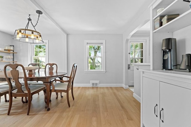 230 Beal Rd, Waltham, MA 02453 - dining room with plenty of natural light, light wood-type flooring, and baseboards