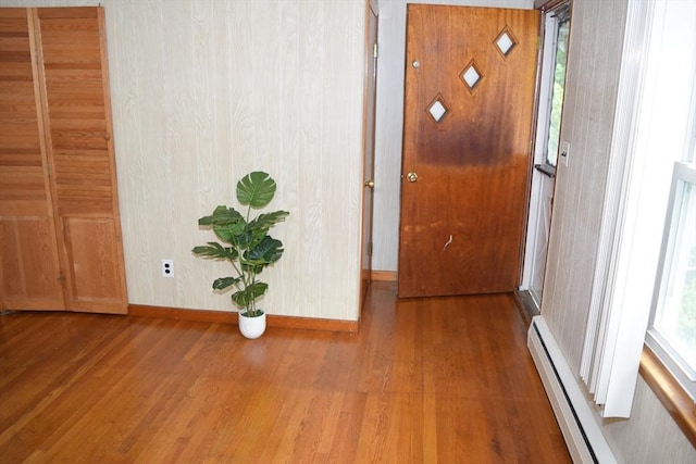 130 Windham Rd, Boston, MA 02136 - hallway featuring wood finished floors, baseboards, and a baseboard heating unit