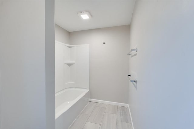 bathroom with shower / bathing tub combination