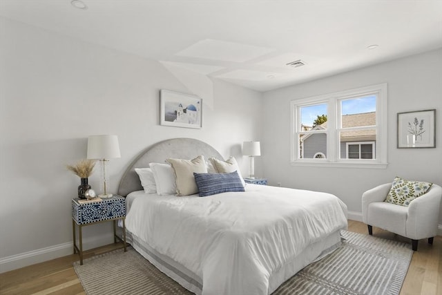 bedroom with light hardwood / wood-style floors