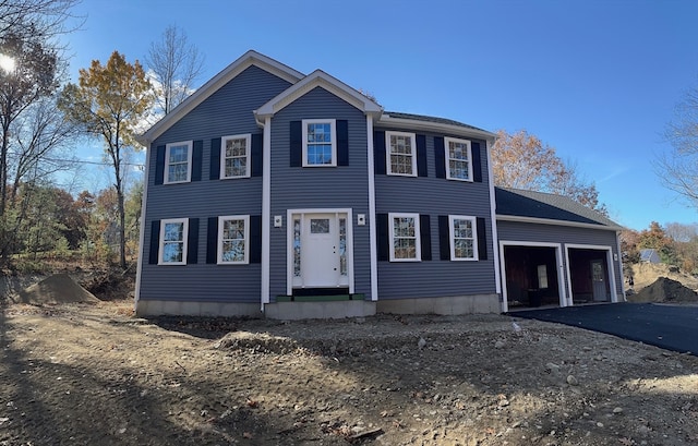 view of front of home with a garage