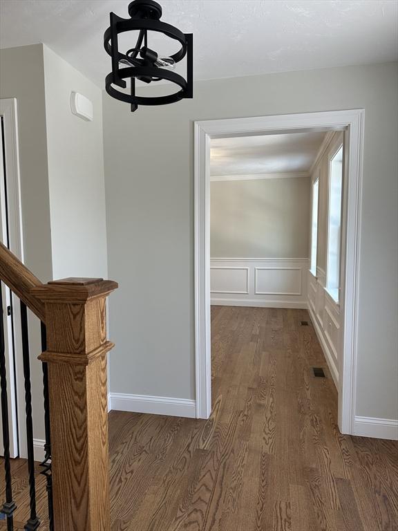 hallway featuring dark hardwood / wood-style floors