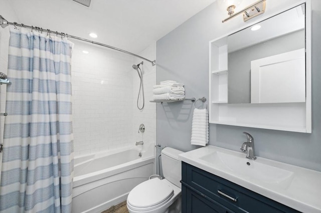 full bath with shower / bathtub combination with curtain, toilet, and vanity