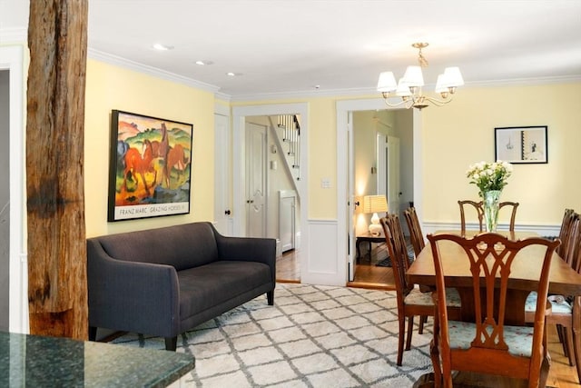 32 School St, Belmont, MA 02478 - living area with a chandelier, ornamental molding, light wood finished floors, wainscoting, and recessed lighting