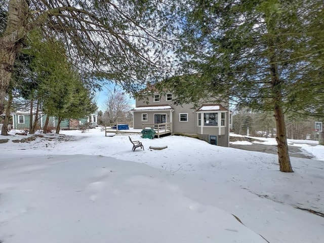 view of snow covered property