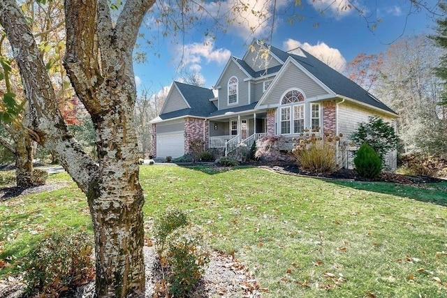 4 Olde Logging Rd, Marion, MA 02738 - traditional-style house with covered porch, an attached garage, a front yard, and brick siding