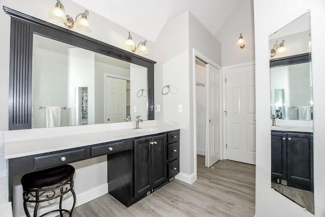 4 Olde Logging Rd, Marion, MA 02738 - full bath with wood finished floors, vanity, baseboards, and lofted ceiling