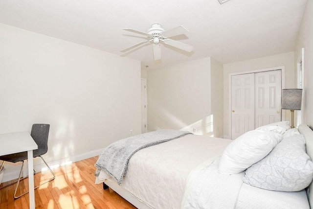 4 Olde Logging Rd, Marion, MA 02738 - bedroom with light wood-type flooring, baseboards, a closet, and a ceiling fan