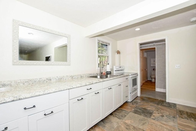 4 Olde Logging Rd, Marion, MA 02738 - bathroom featuring stone finish floors, baseboards, toilet, vanity, and recessed lighting
