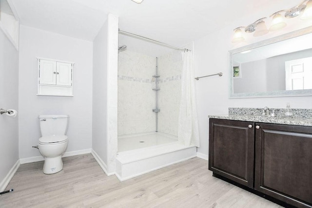 4 Olde Logging Rd, Marion, MA 02738 - full bath with wood finished floors, a tile shower, toilet, and vanity