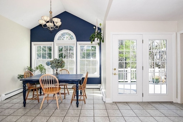 dining room with a baseboard radiator, lofted ceiling, light tile patterned floors, and a chandelier