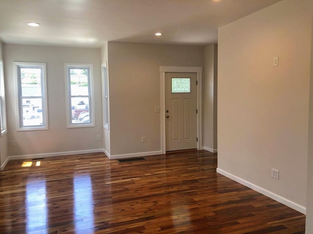 28-32 Calvary St, Waltham, MA 02453 - entryway with dark wood-style floors, visible vents, baseboards, and recessed lighting