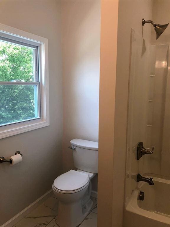 28-32 Calvary St, Waltham, MA 02453 - bathroom with shower / washtub combination, baseboards, and toilet