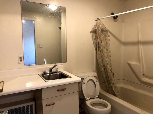 28-32 Calvary St, Waltham, MA 02453 - bathroom with toilet, shower / bath combo, vanity, and radiator