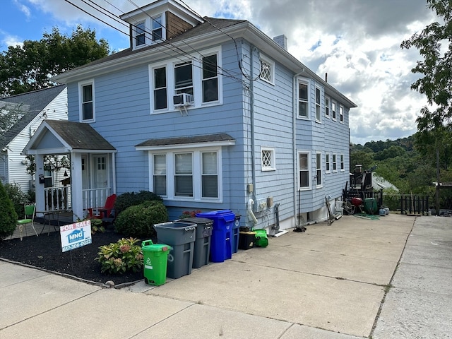 view of front of property featuring cooling unit