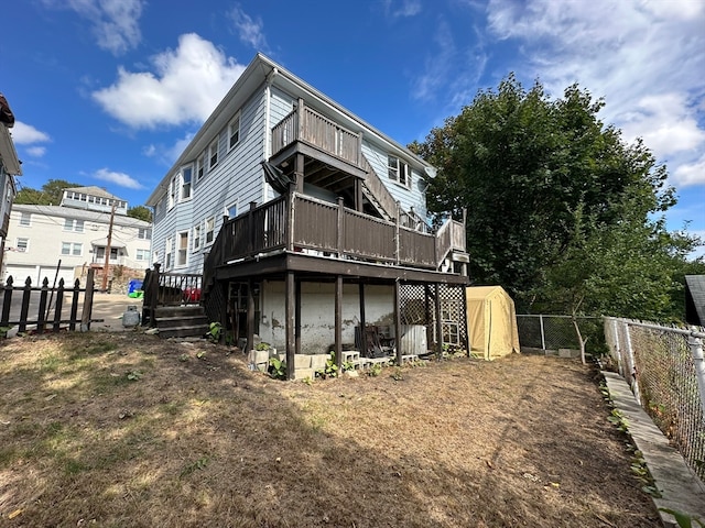 rear view of property with a deck