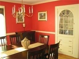 dining room featuring crown molding