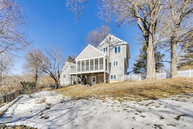 100 Bridge St, Medfield, MA 02052 - view of front of property with a sunroom and a fenced backyard