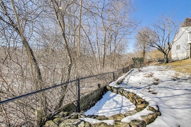 100 Bridge St, Medfield, MA 02052 - yard covered in snow with fence