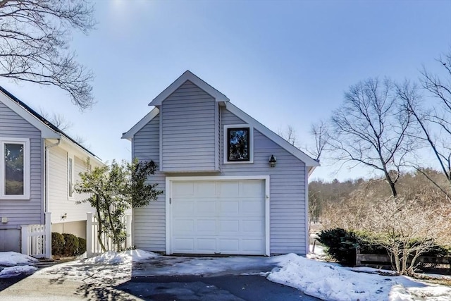 100 Bridge St, Medfield, MA 02052 - view of snow covered garage