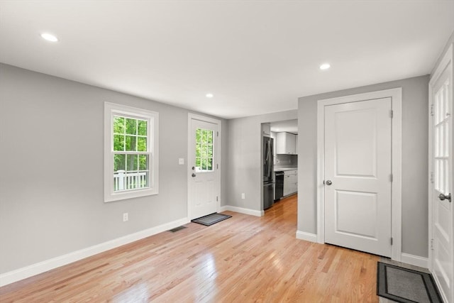 7 Chestnut St, West Newbury, MA 01985 - foyer featuring light wood-style flooring, baseboards, and recessed lighting
