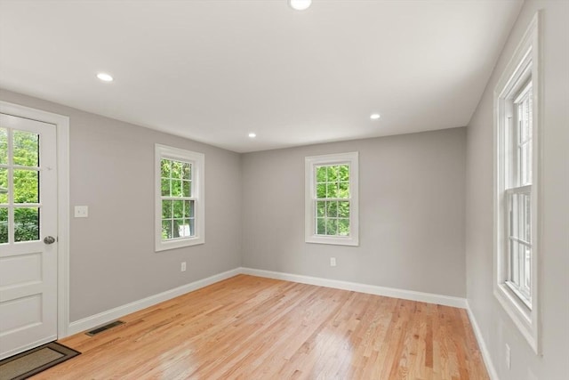 7 Chestnut St, West Newbury, MA 01985 - spare room with plenty of natural light, light wood-type flooring, baseboards, and recessed lighting