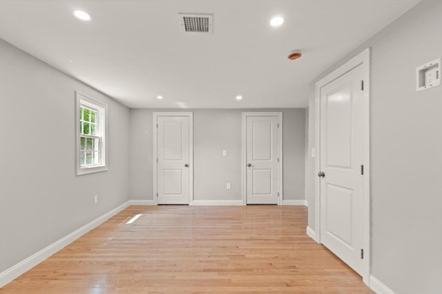7 Chestnut St, West Newbury, MA 01985 - empty room with recessed lighting, light wood-style floors, and baseboards
