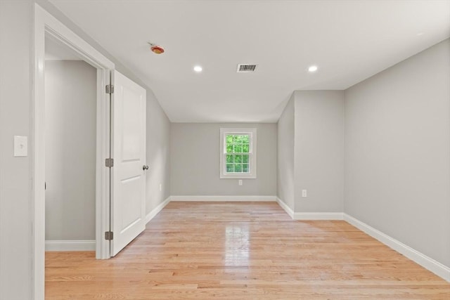 7 Chestnut St, West Newbury, MA 01985 - unfurnished room featuring light wood finished floors, baseboards, recessed lighting, and vaulted ceiling