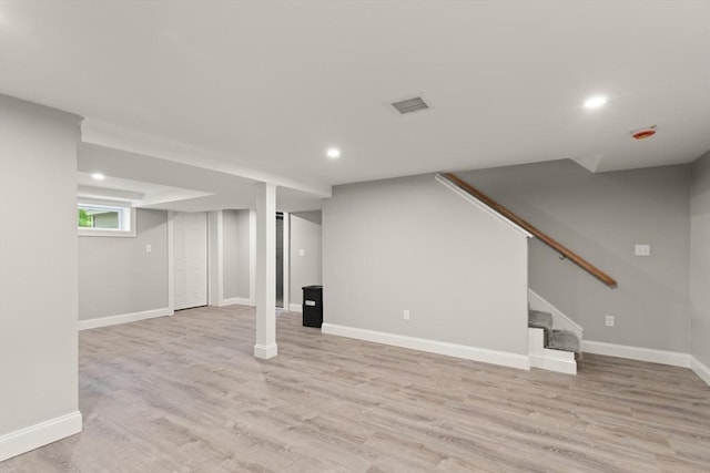 7 Chestnut St, West Newbury, MA 01985 - below grade area featuring light wood-type flooring, recessed lighting, baseboards, and stairway