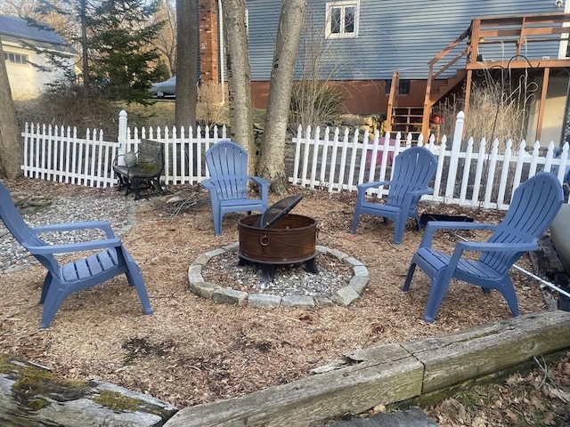 169 Green St, Gardner, MA 01440 - view of patio / terrace featuring a fire pit and stairs